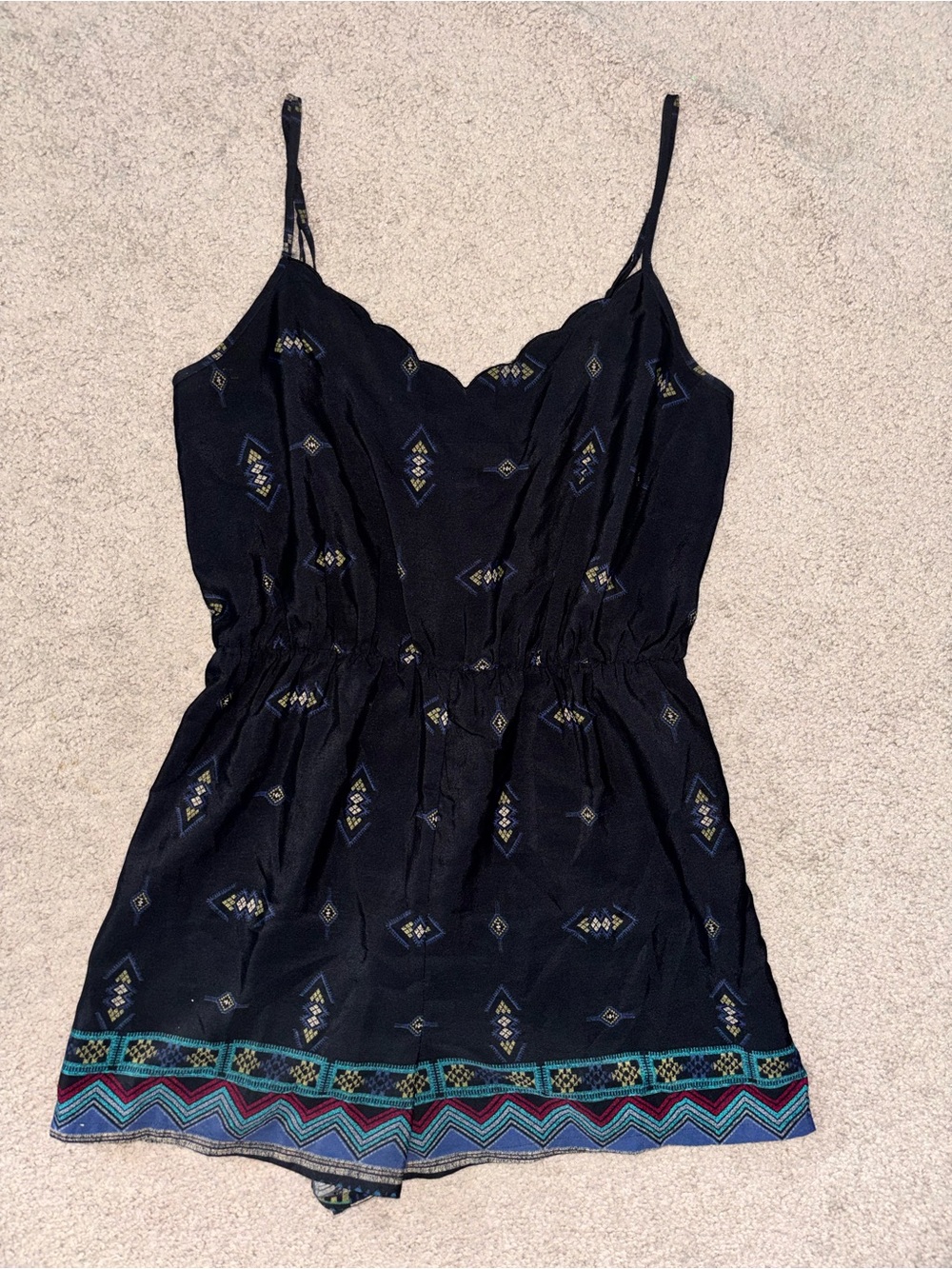 Staring at Stars Black Printed Spaghetti-Strap Romper with Embroidered Hem